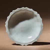 A Chinese Blanc-de-Chine Porcelain Floriform Dish, Late Ming Dynasty — 明晚期 德化白瓷花口碟
