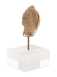 A Roman Stone Head of a Woman