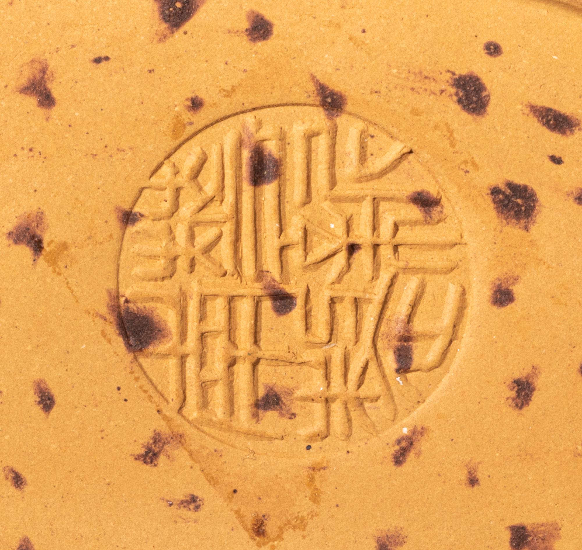 Nine Chinese Pottery Tea Articles