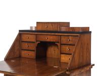 A Biedermeier Parcel Ebonized Birch Slant-Front Secretary