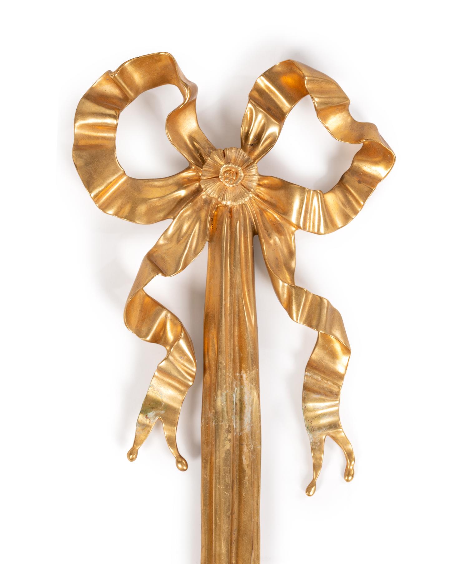 A Pair of Louis XVI Style Gilt Bronze Four-Light Wall Sconces
