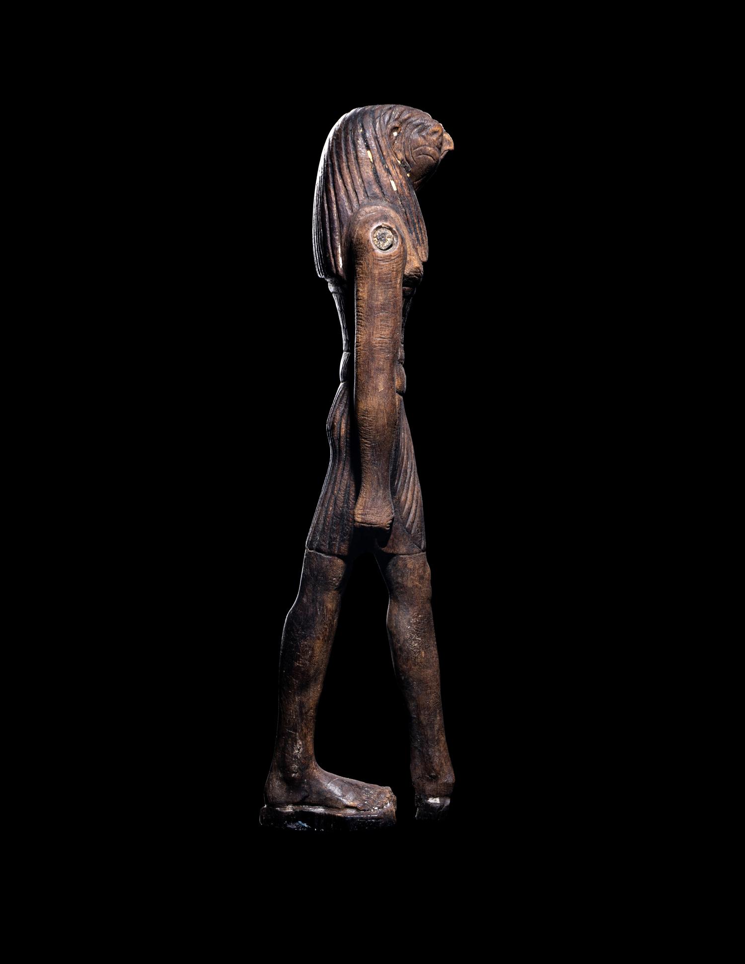 An Egyptian Wood Striding Montu