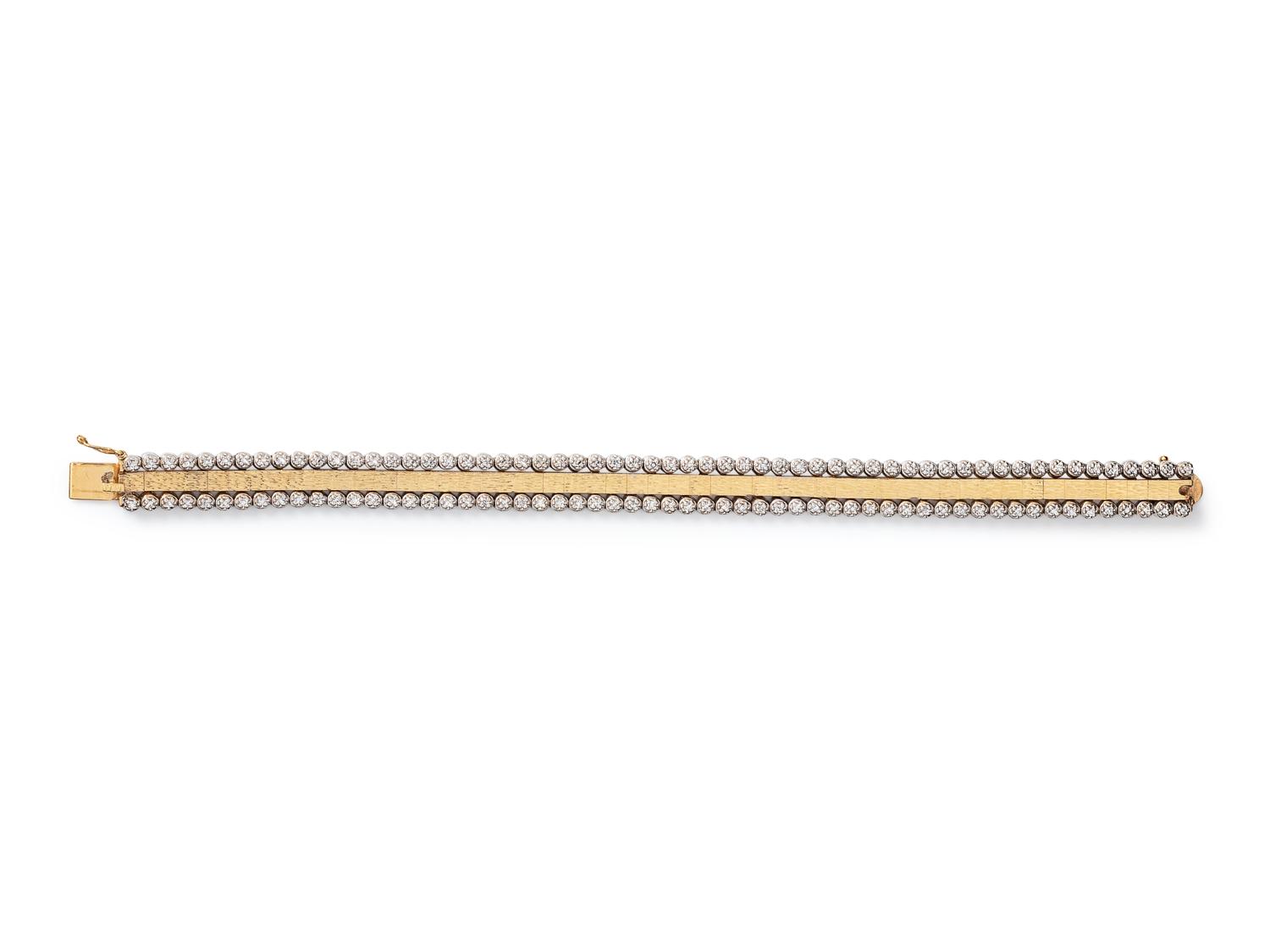 A 14 Karat Bicolor Gold and Diamond Bracelet,