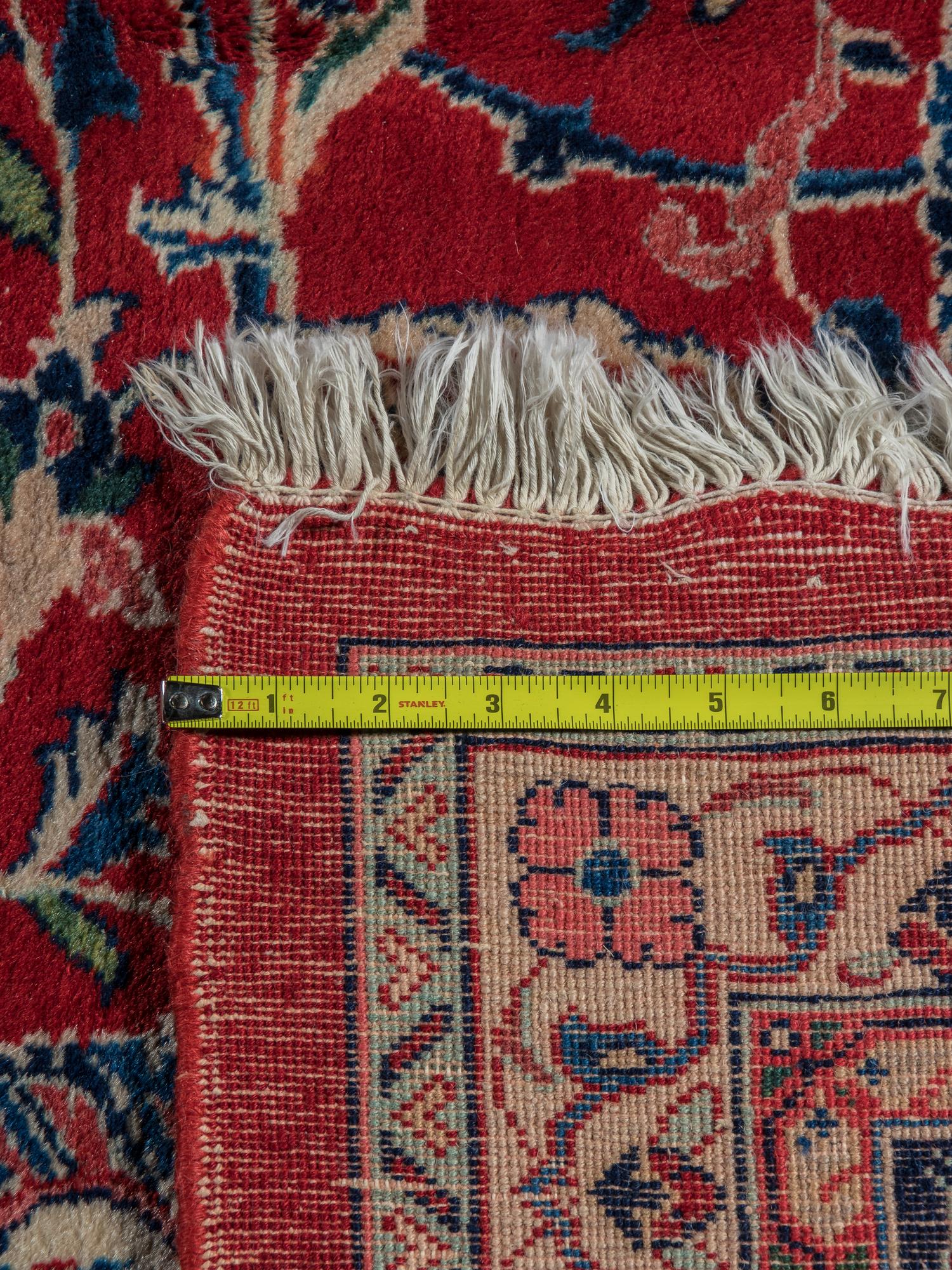 A Kashan Wool Rug