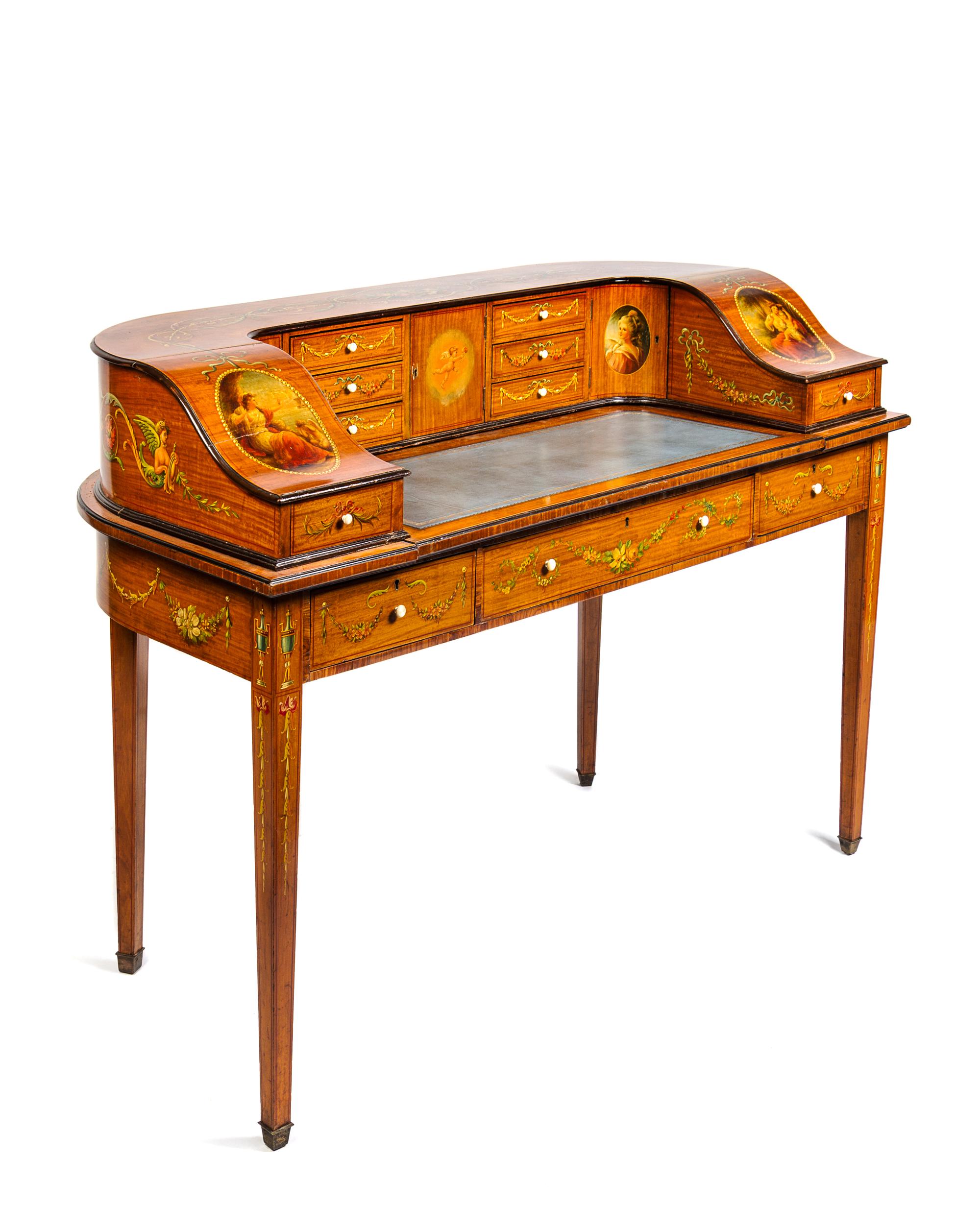 An Edwardian Painted and Inlaid Satinwood Carlton House Desk Height 37 x width 52 x depth 24 inches.