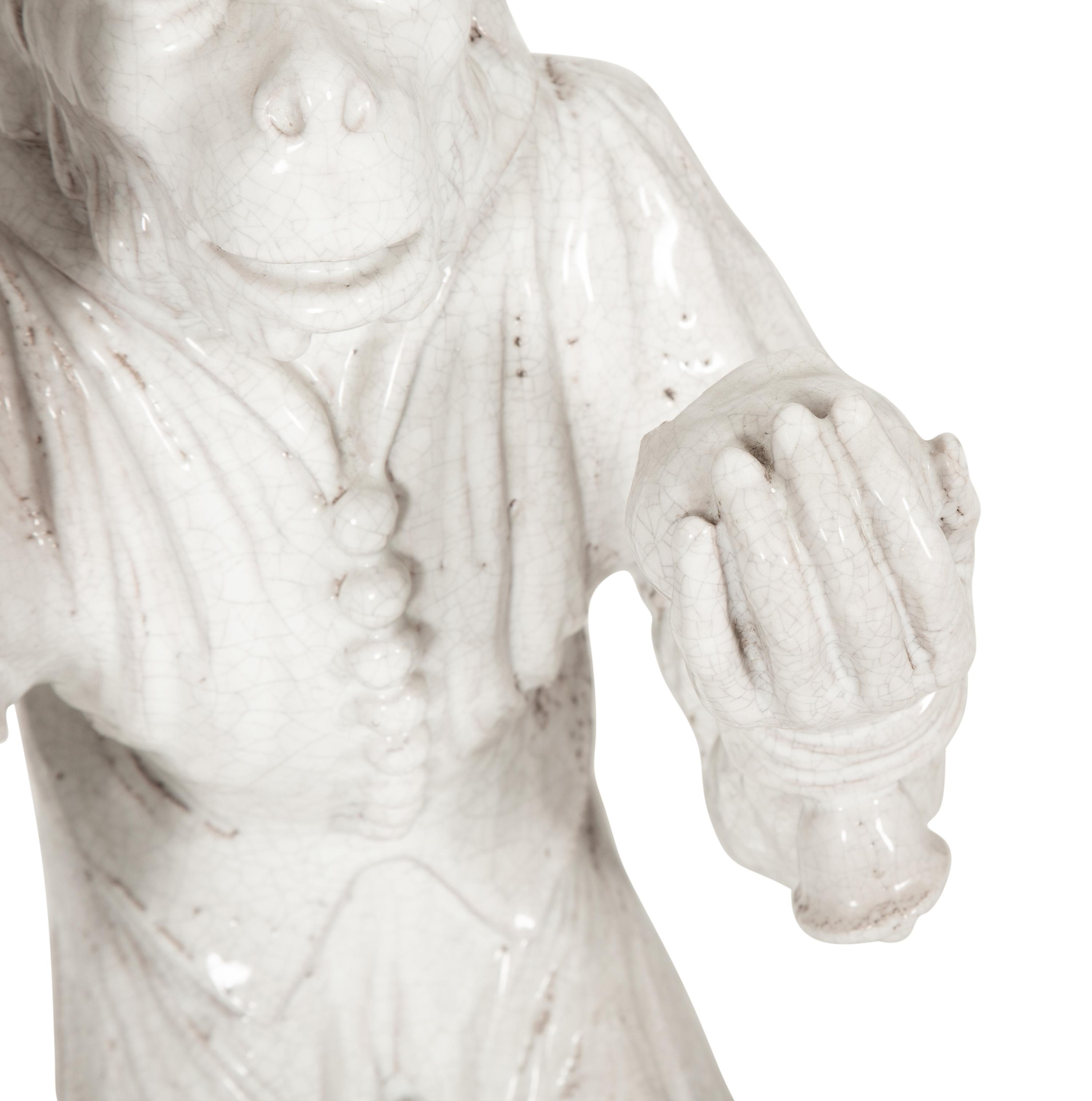 An Italian Glazed Terra Cotta Monkey Sculpture