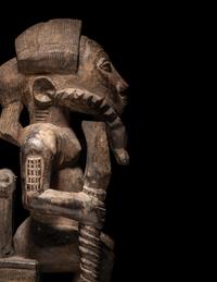 A Baule Wood Seated Male Figure