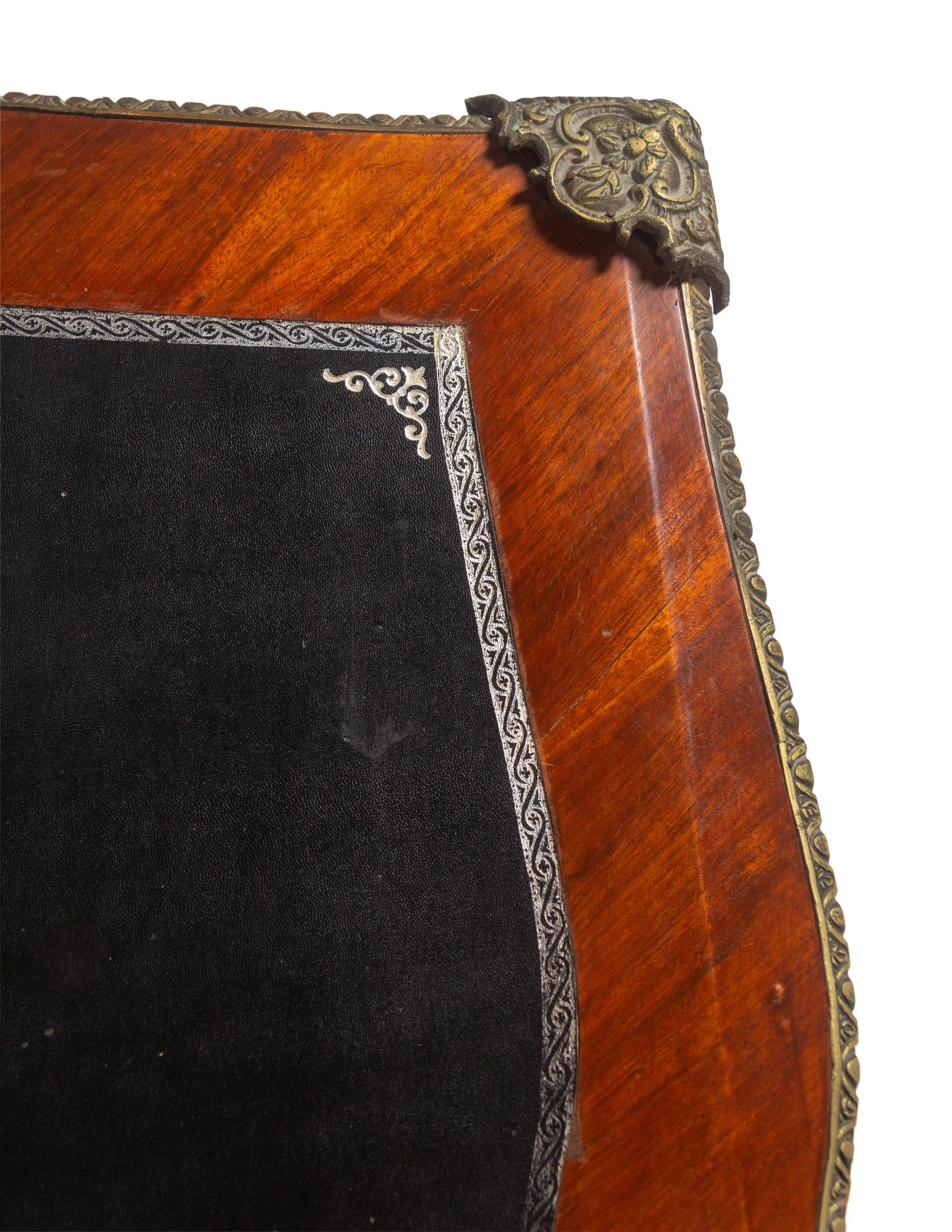 A Louis XV Style Gilt Metal Mounted Walnut Bureau Plat
