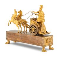 An Empire Gilt Bronze Figural Mantel Clock