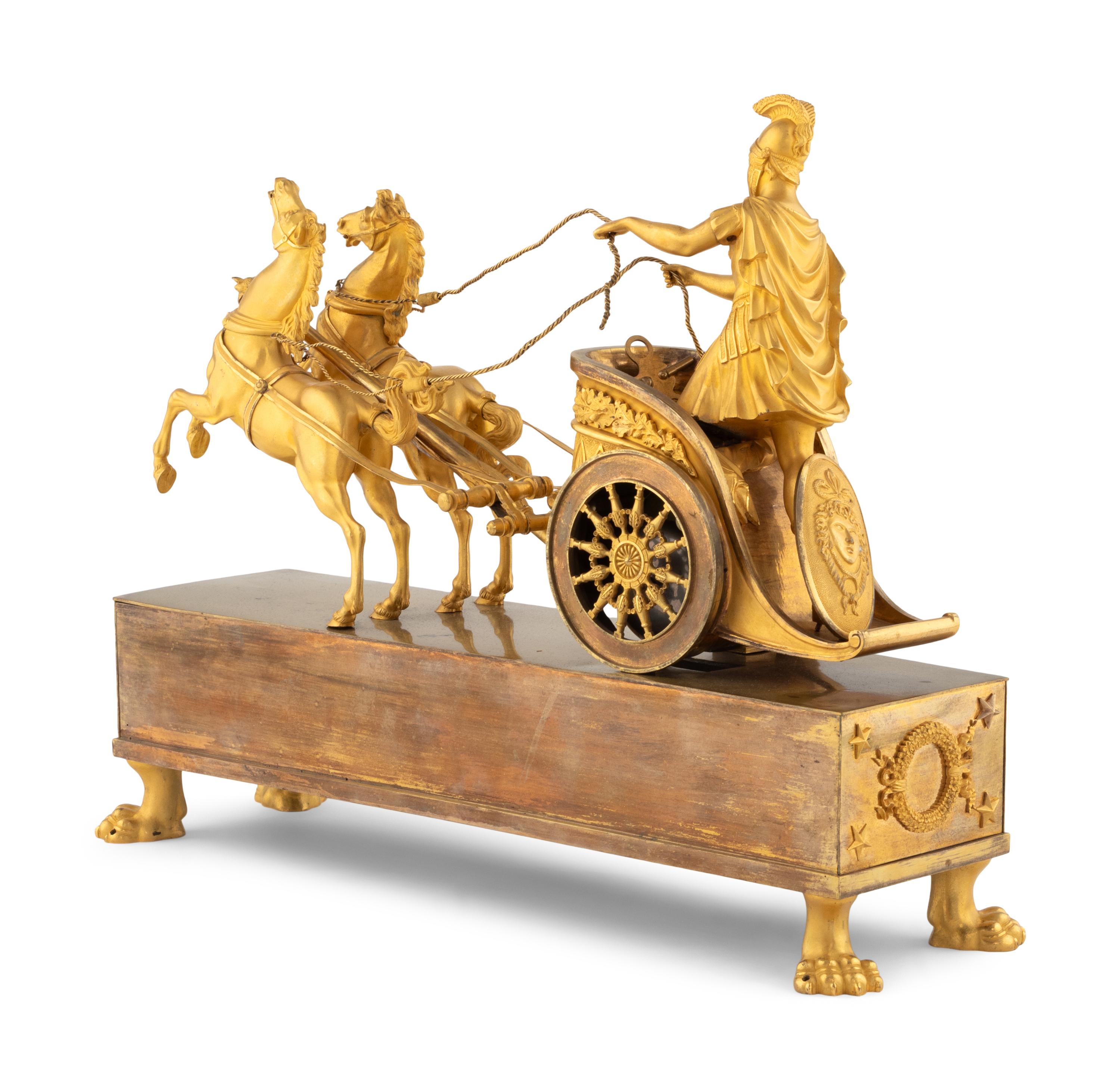 An Empire Gilt Bronze Figural Mantel Clock
