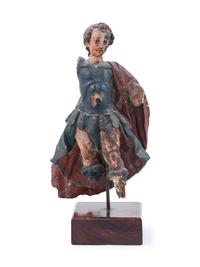 A Continental Carved and Polychromed Santo Figure