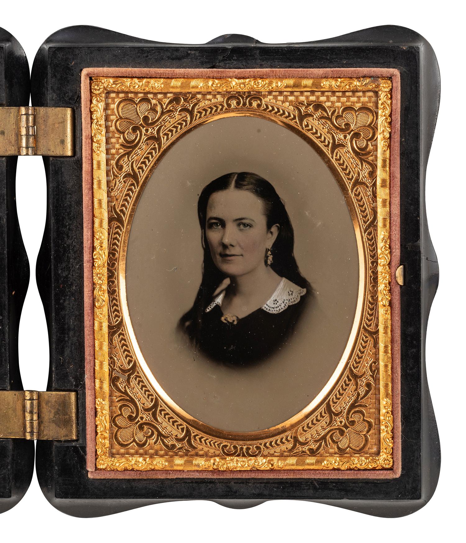 [EARLY PHOTOGRAPHY]. An artistic quarter plate ruby ambrotype of a lovely young woman.