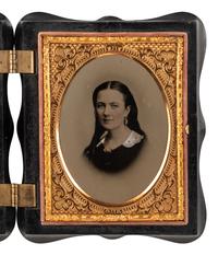 [EARLY PHOTOGRAPHY]. An artistic quarter plate ruby ambrotype of a lovely young woman.