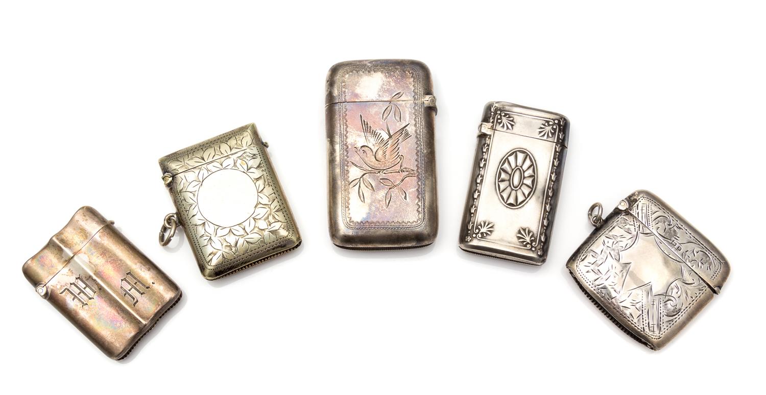 A Collection of Four Vesta Cases, Various Makers, comprising a 14 karat gold-filled example with foliate volute banding; an example wit