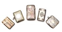 A Collection of Four Vesta Cases, Various Makers, comprising a 14 karat gold-filled example with foliate volute banding; an example wit