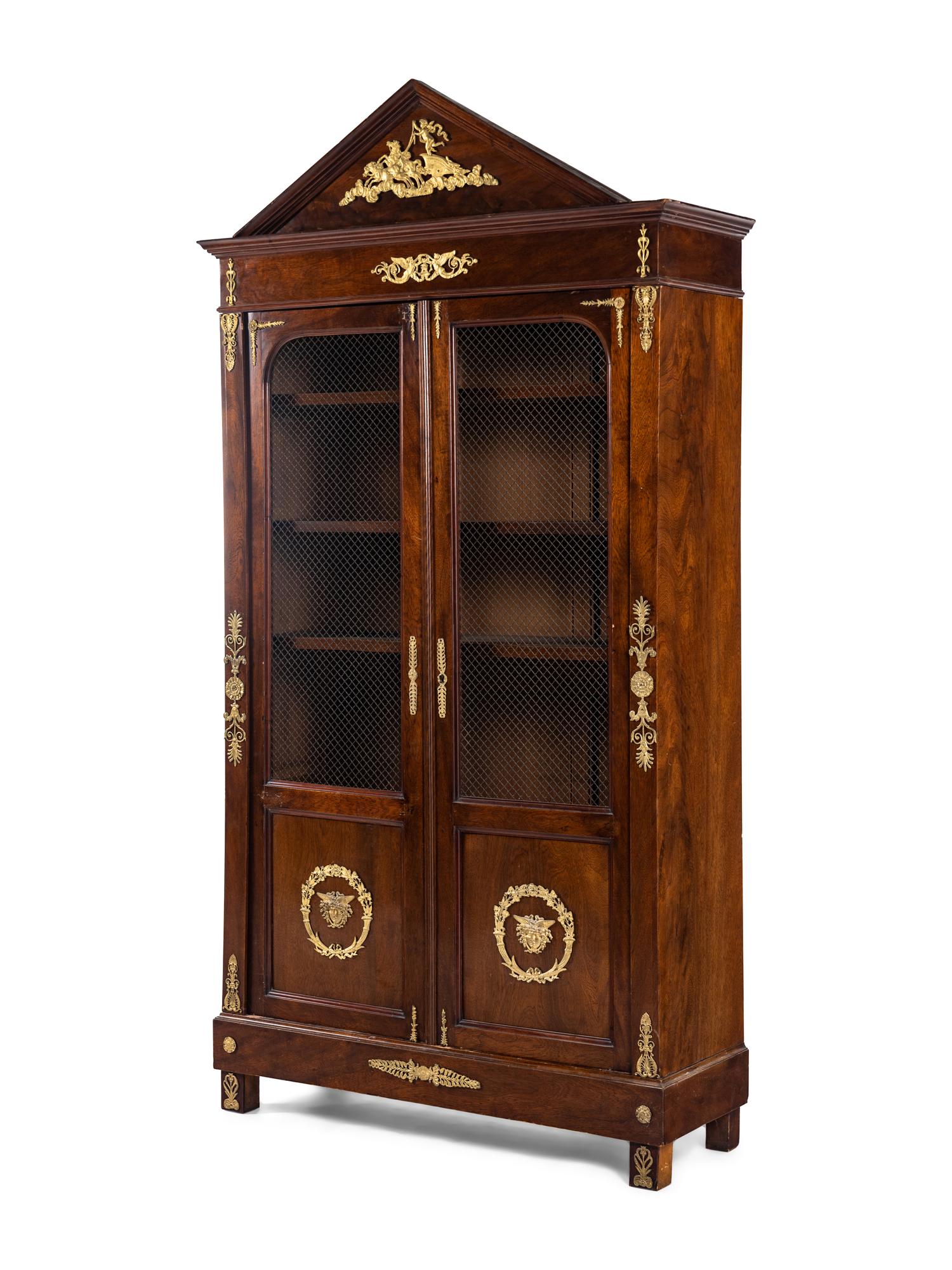 An Empire Style Gilt Metal Mounted Mahogany Bookcase