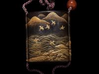 A Japanese Gold and Black Lacquer Three-Case Inro