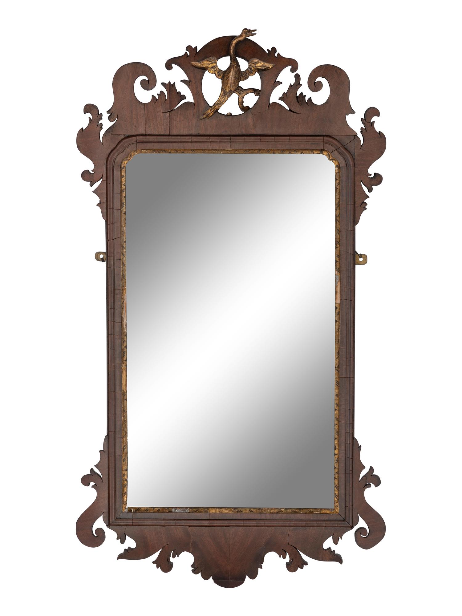 A Chippendale Carved and Parcel-Gilt Mahogany Looking Glass