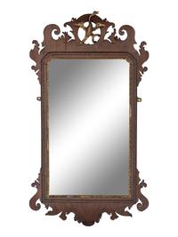 A Chippendale Carved and Parcel-Gilt Mahogany Looking Glass