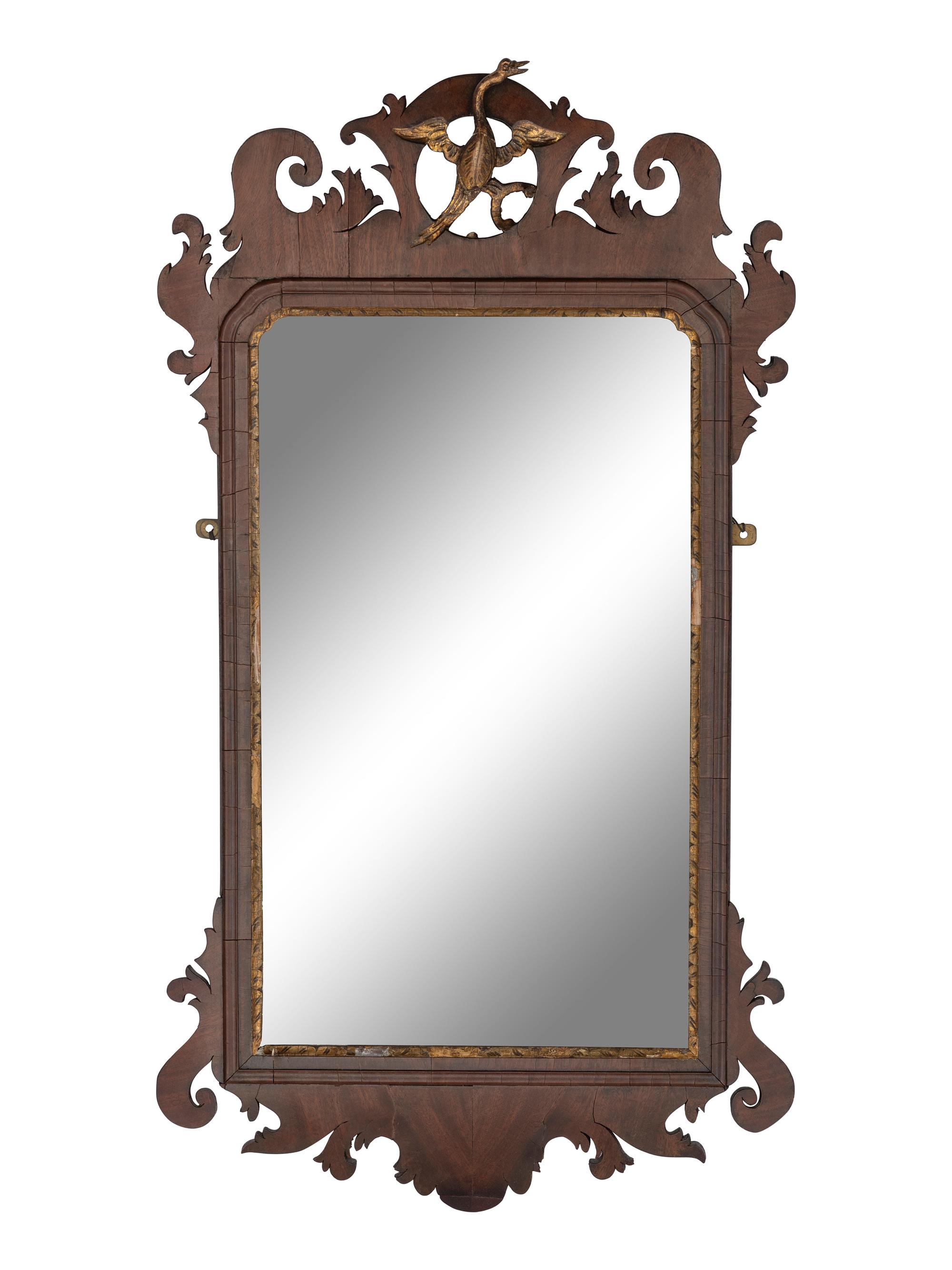 A Chippendale Carved and Parcel-Gilt Mahogany Looking Glass
