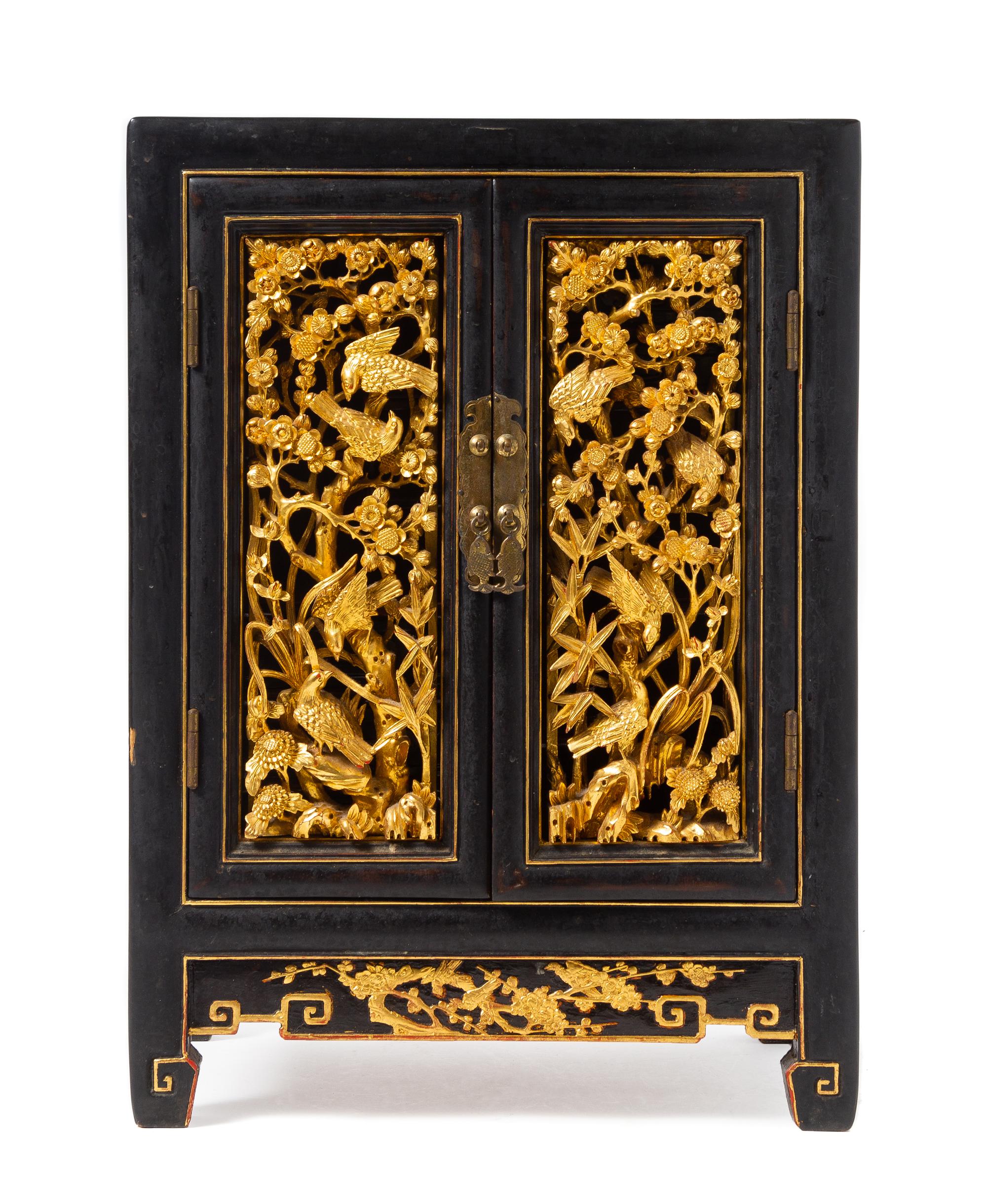 A Small Gilt Decorated Red Lacquered Wood Kang Cabinet, Kanggui Height 20 x width 14 x depth 9 3/8 inches. — 19TH CENTURY