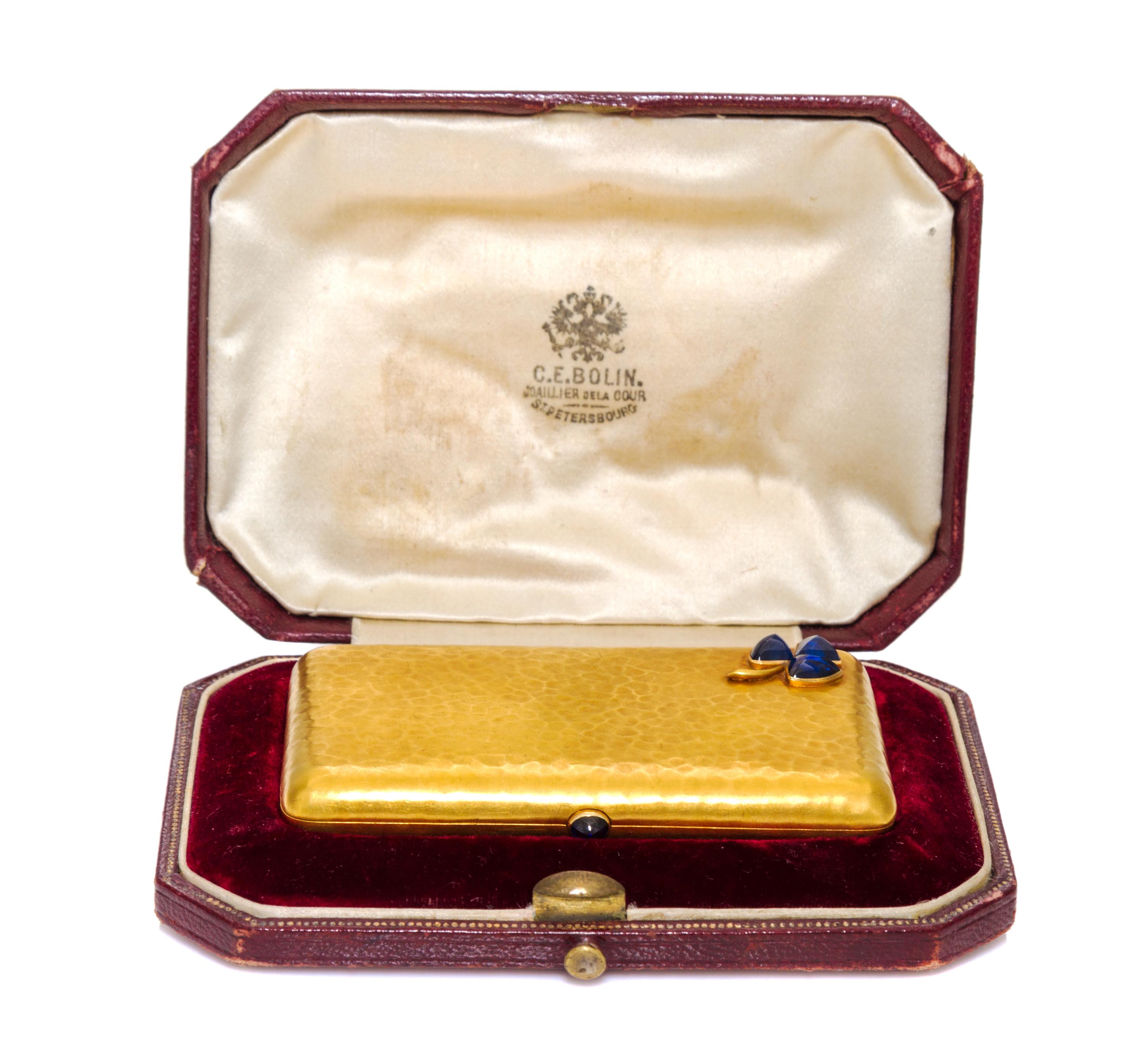A Russian Gold and Sapphire Inset Cigarette Case, Edward Schramm, St. Petersburg, 19th/20th Century, of rectangular form with shamrock
