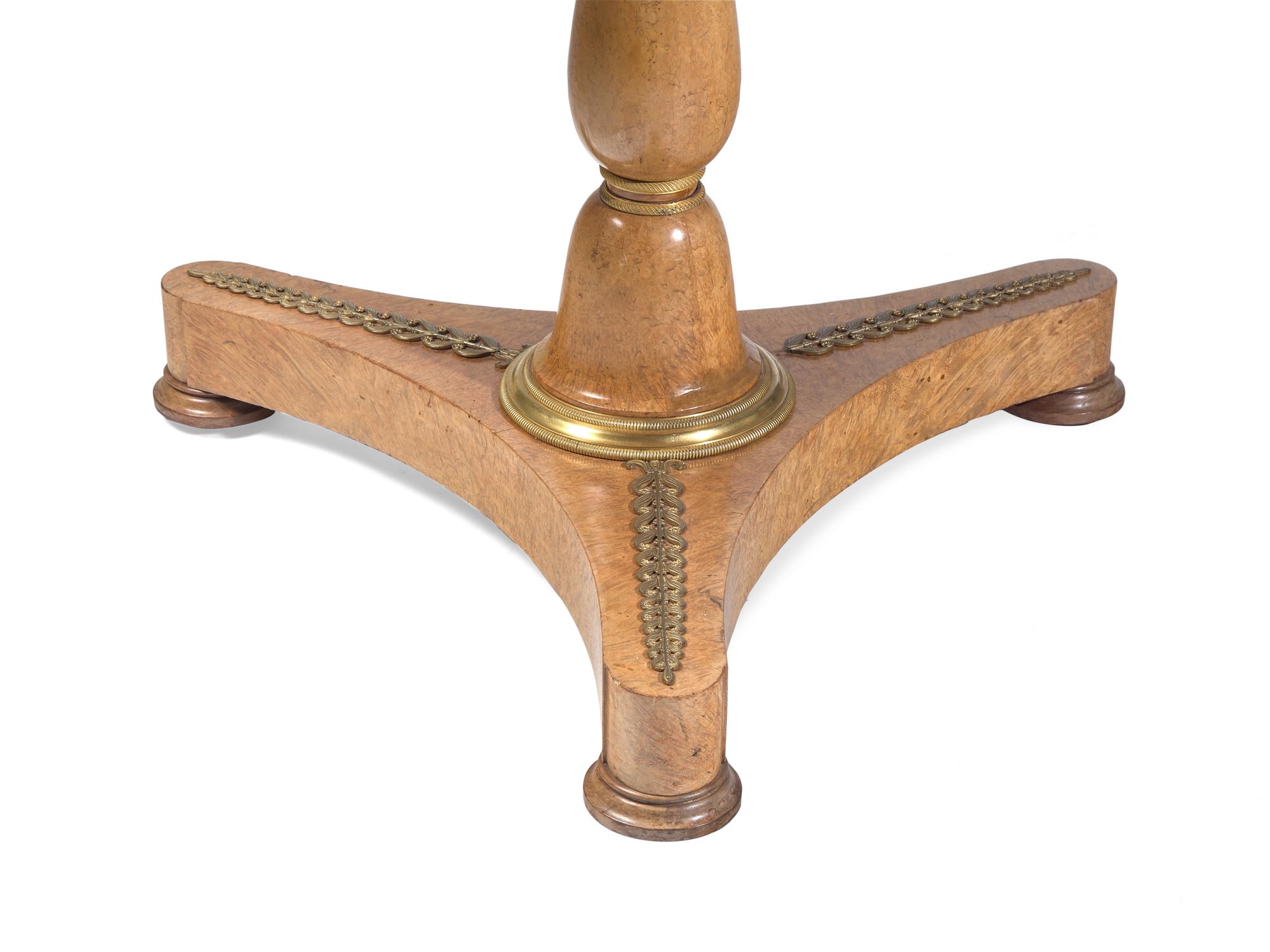 A Charles X Amboyna Breakfast Table