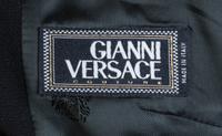 A Gianni Versace Couture Black Wool Jacket and Skirt Ensemble, Size 44.