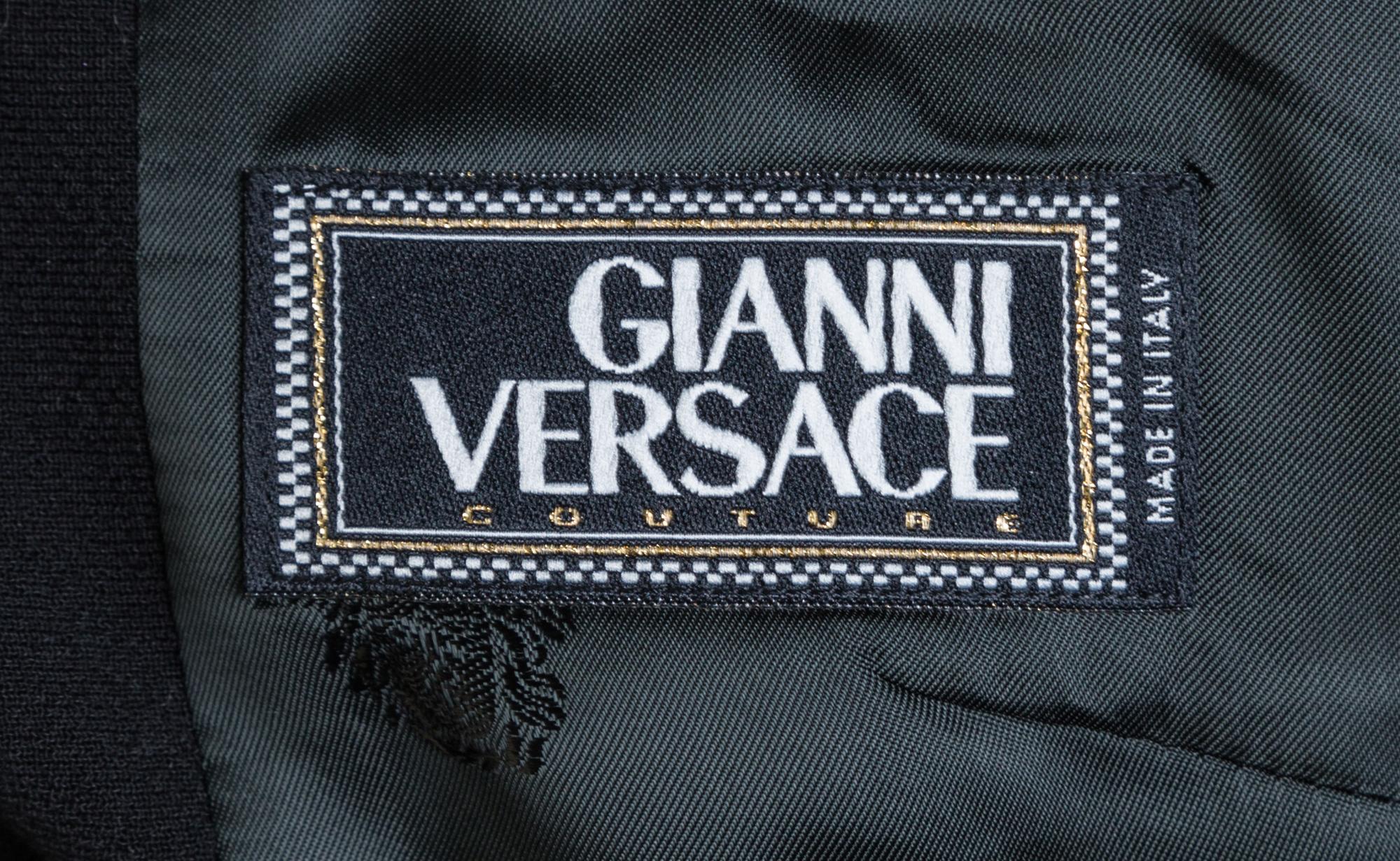 A Gianni Versace Couture Black Wool Jacket and Skirt Ensemble, Size 44.