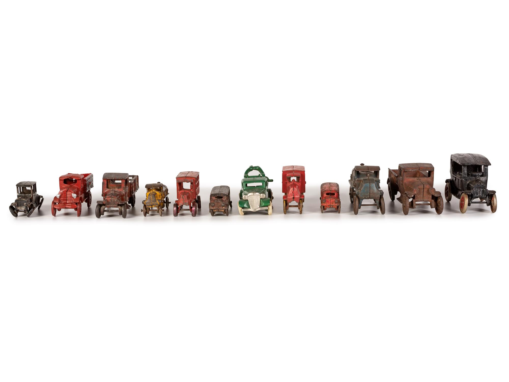 Twelve Painted Cast Iron Toy Cars, Trucks, and Buses