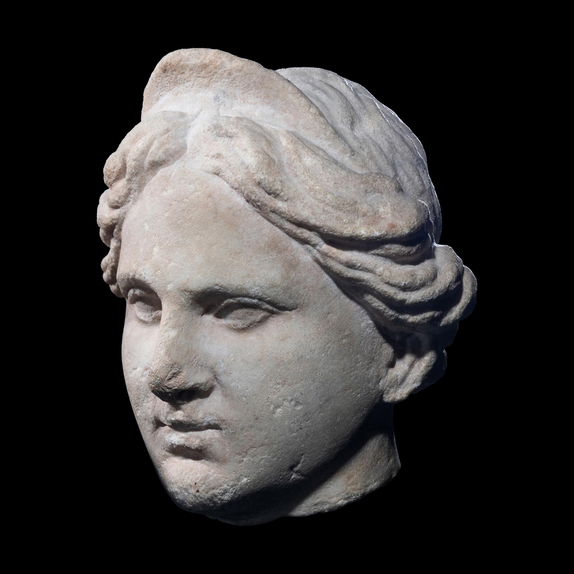 A Roman Marble Head of a Goddess