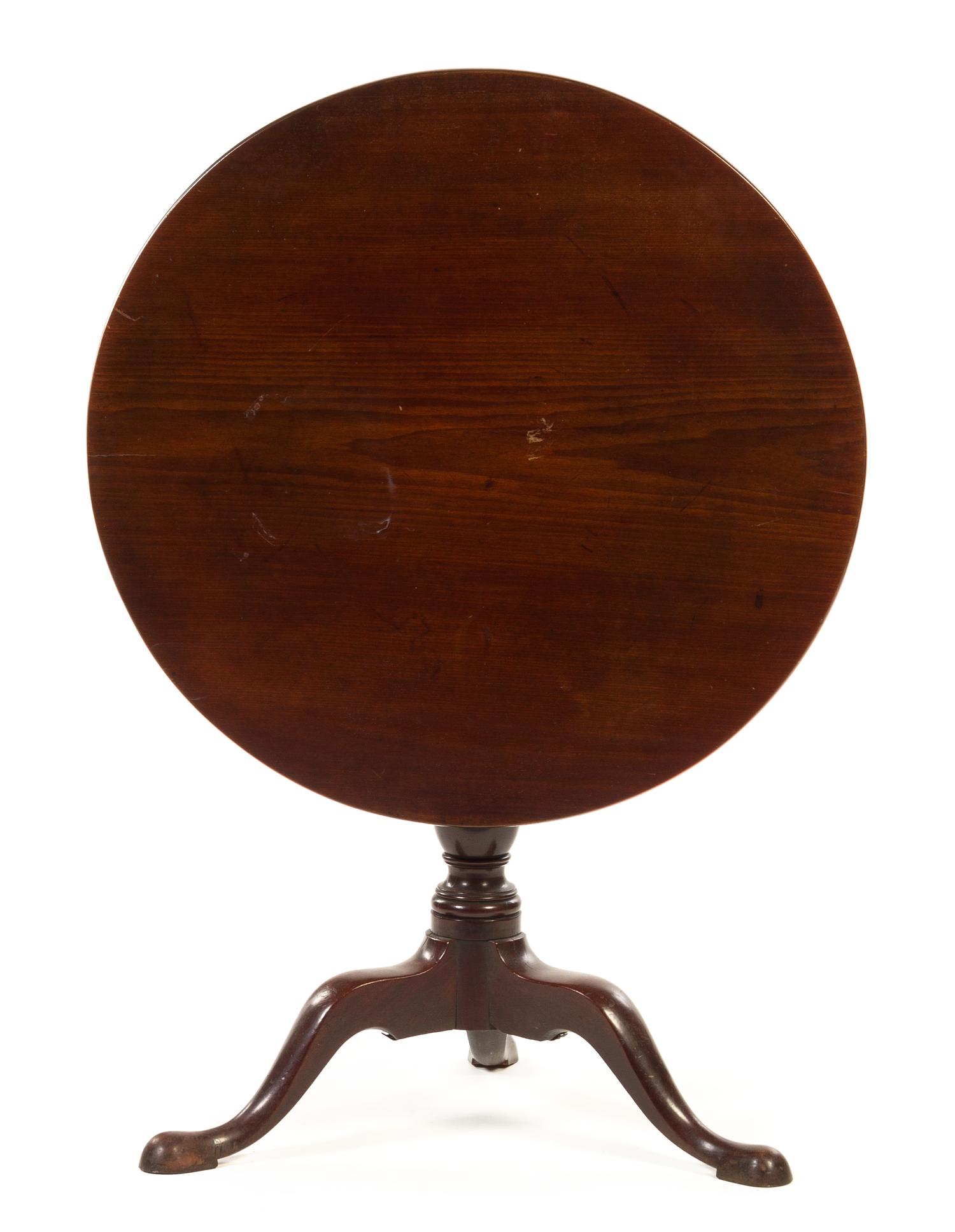 A Chippendale Style Tilt-Top Table Height 27 x depth 27 1/2 inches.