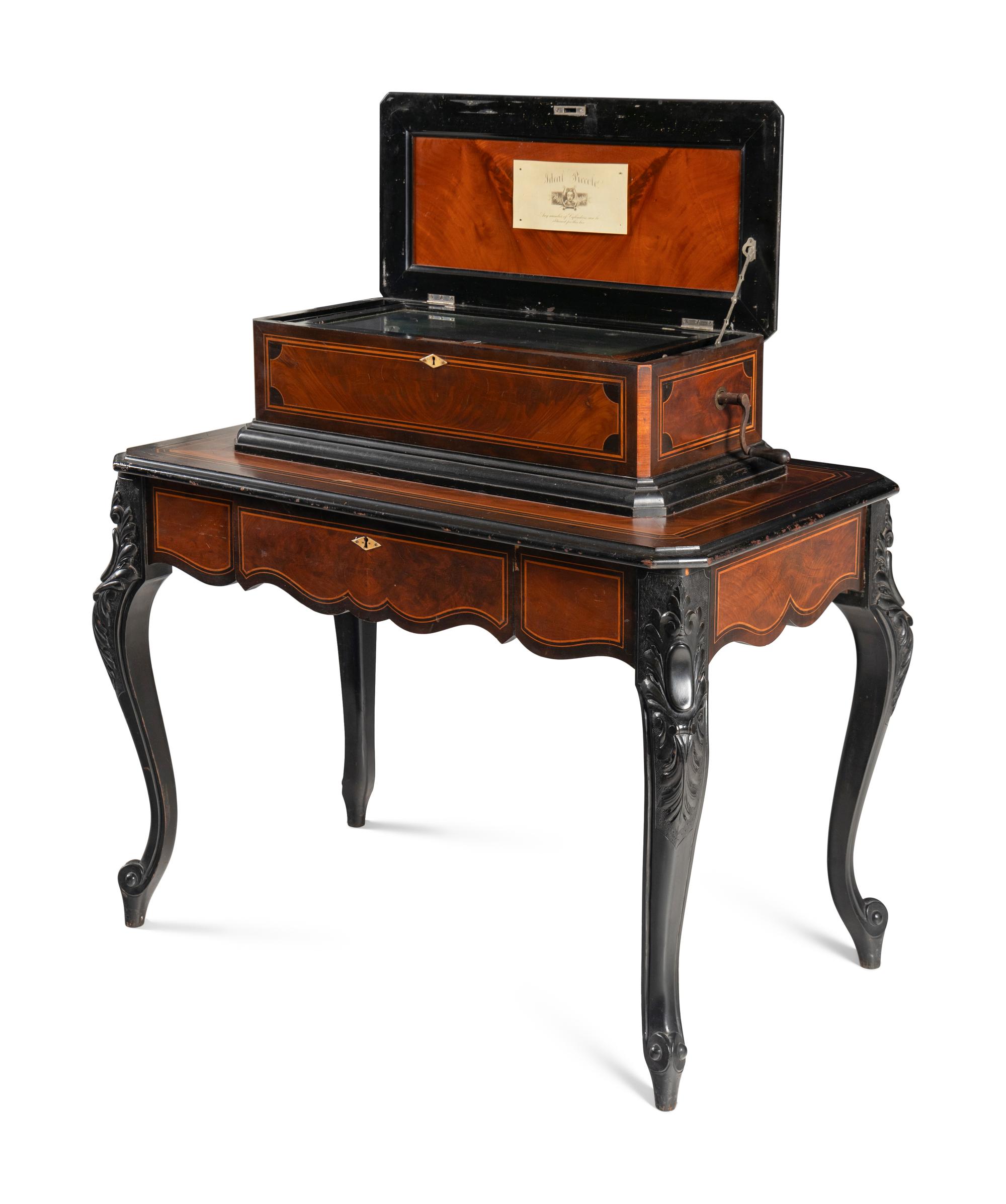 An Ideal Piccolo Music Box on Table by Mermod Frères