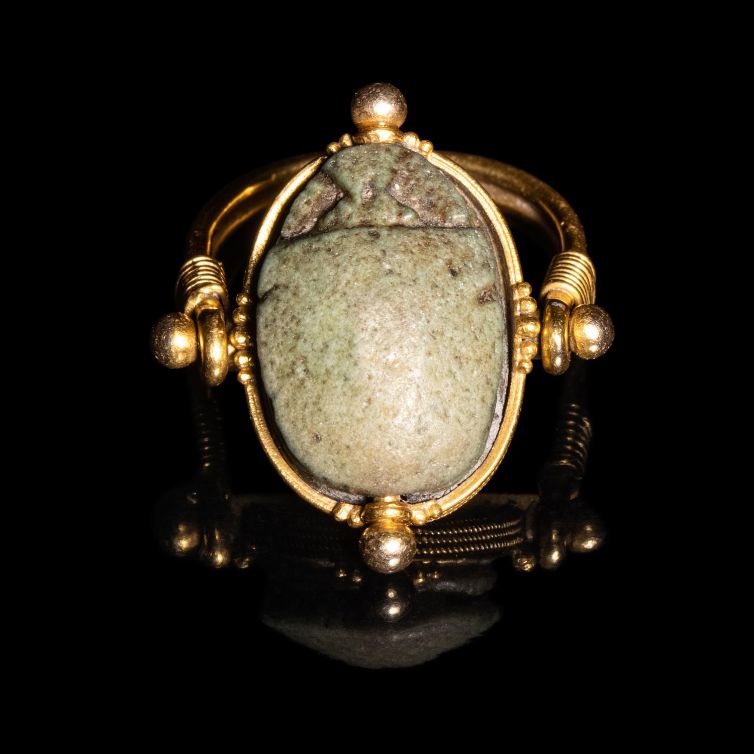 An Egyptian Faience Scarab Swivel Ring