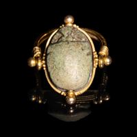 An Egyptian Faience Scarab Swivel Ring