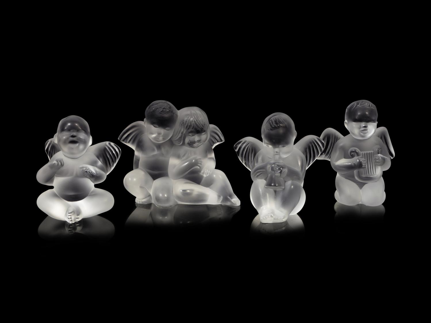 Four Lalique Cherub Figures