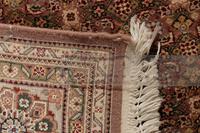 A Tabriz Wool Rug