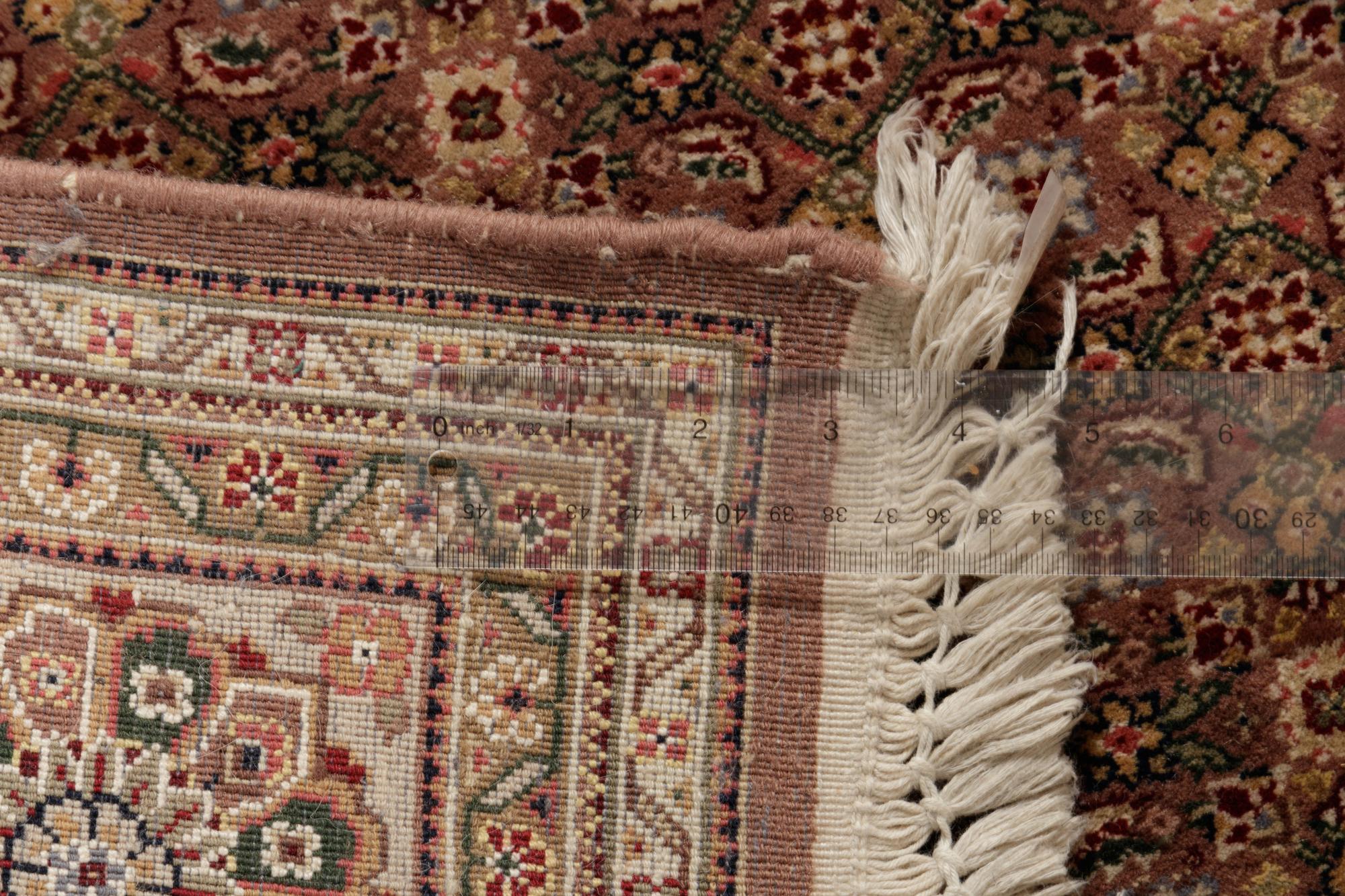 A Tabriz Wool Rug