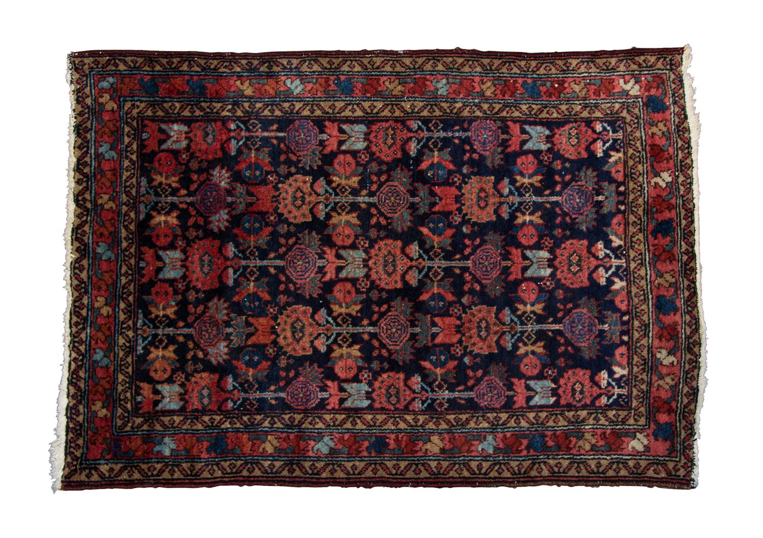 A Sarouk Wool Rug 3 feet 9 inches x 2 feet 8 inches.