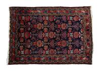 A Sarouk Wool Rug 3 feet 9 inches x 2 feet 8 inches.