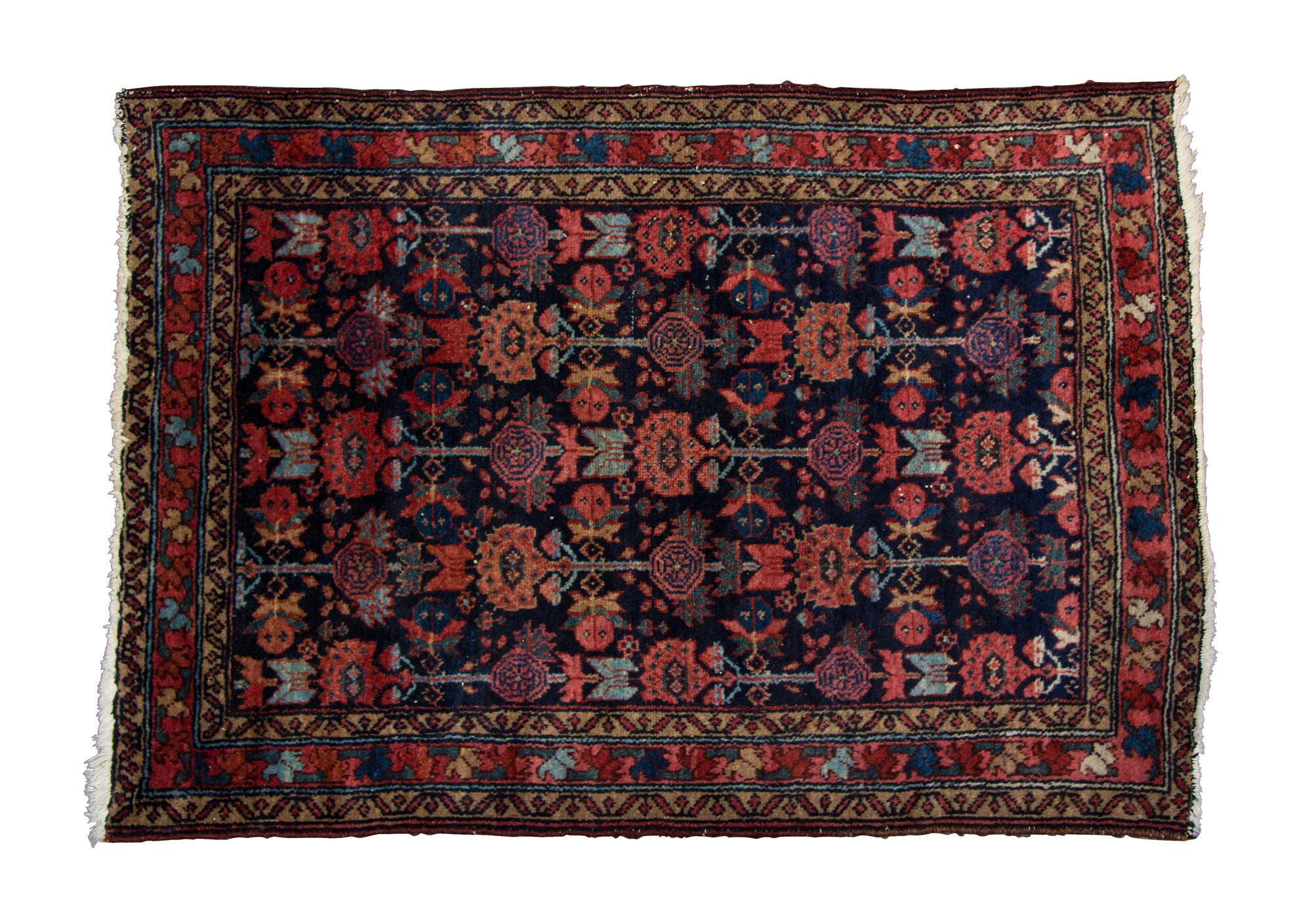 A Sarouk Wool Rug 3 feet 9 inches x 2 feet 8 inches.