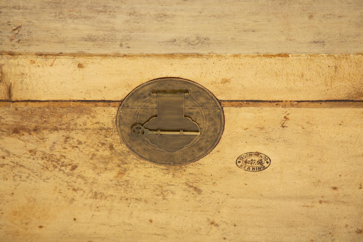A Chinese Parchment Leather Bound Trunk with Brass Mounts and Handles