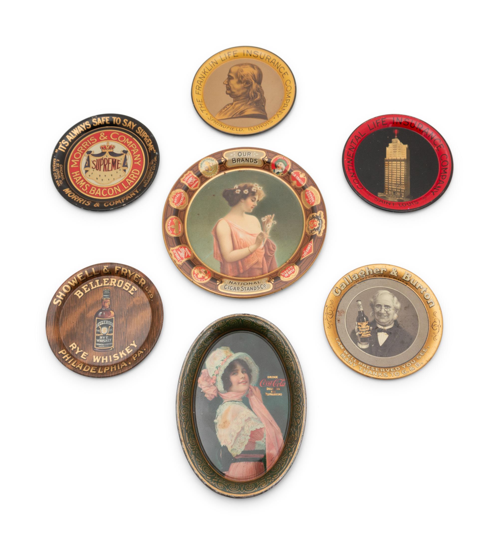 A Collection of Seven Tin Lithographed Advertising Tip Trays