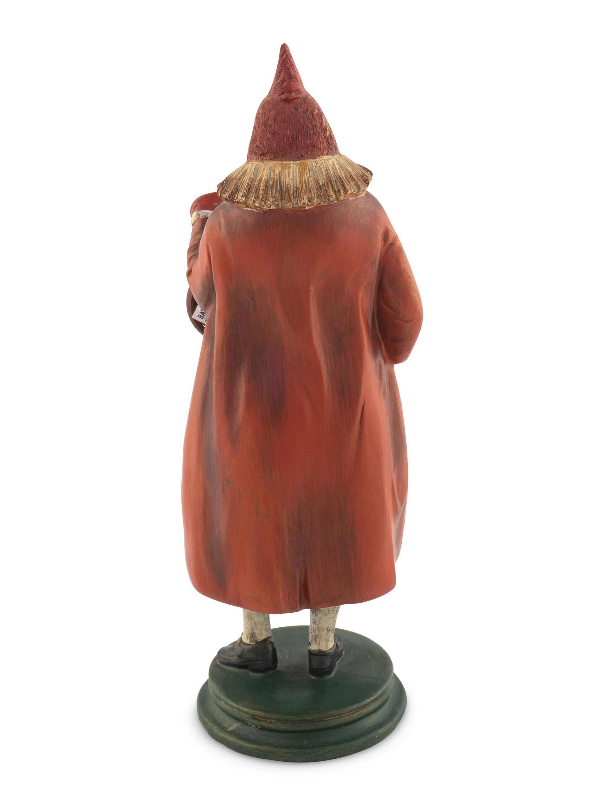 A Polychrome Resin Figural Clock