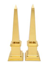 A Pair of Polished Brass Obelisks