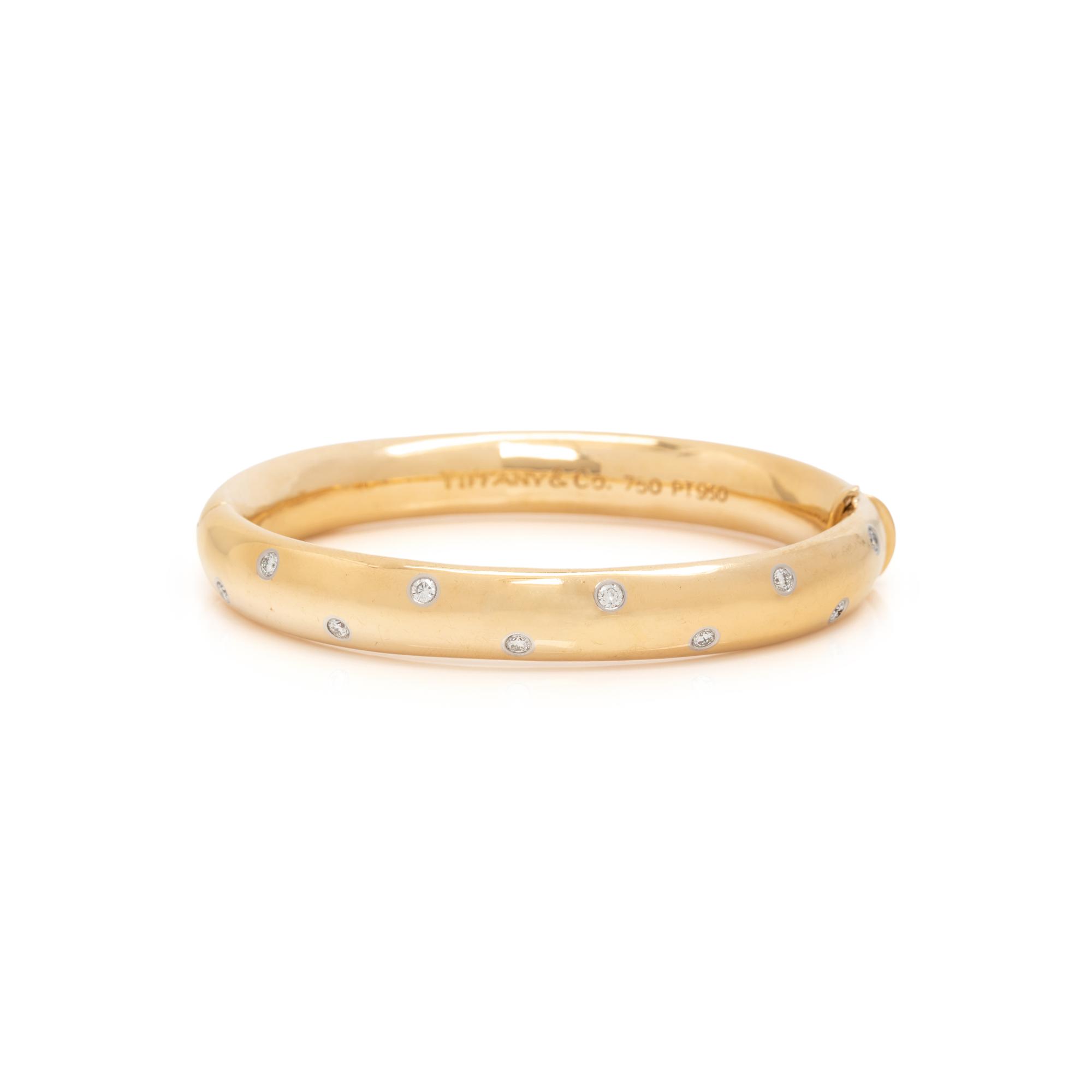 TIFFANY & CO., YELLOW GOLD AND DIAMOND ‘ETOILE’ BANGLE BRACELET