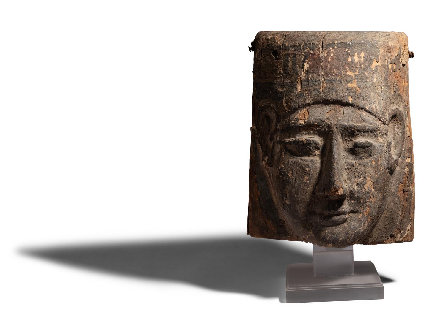 An Egyptian Painted Wood Mummy Mask