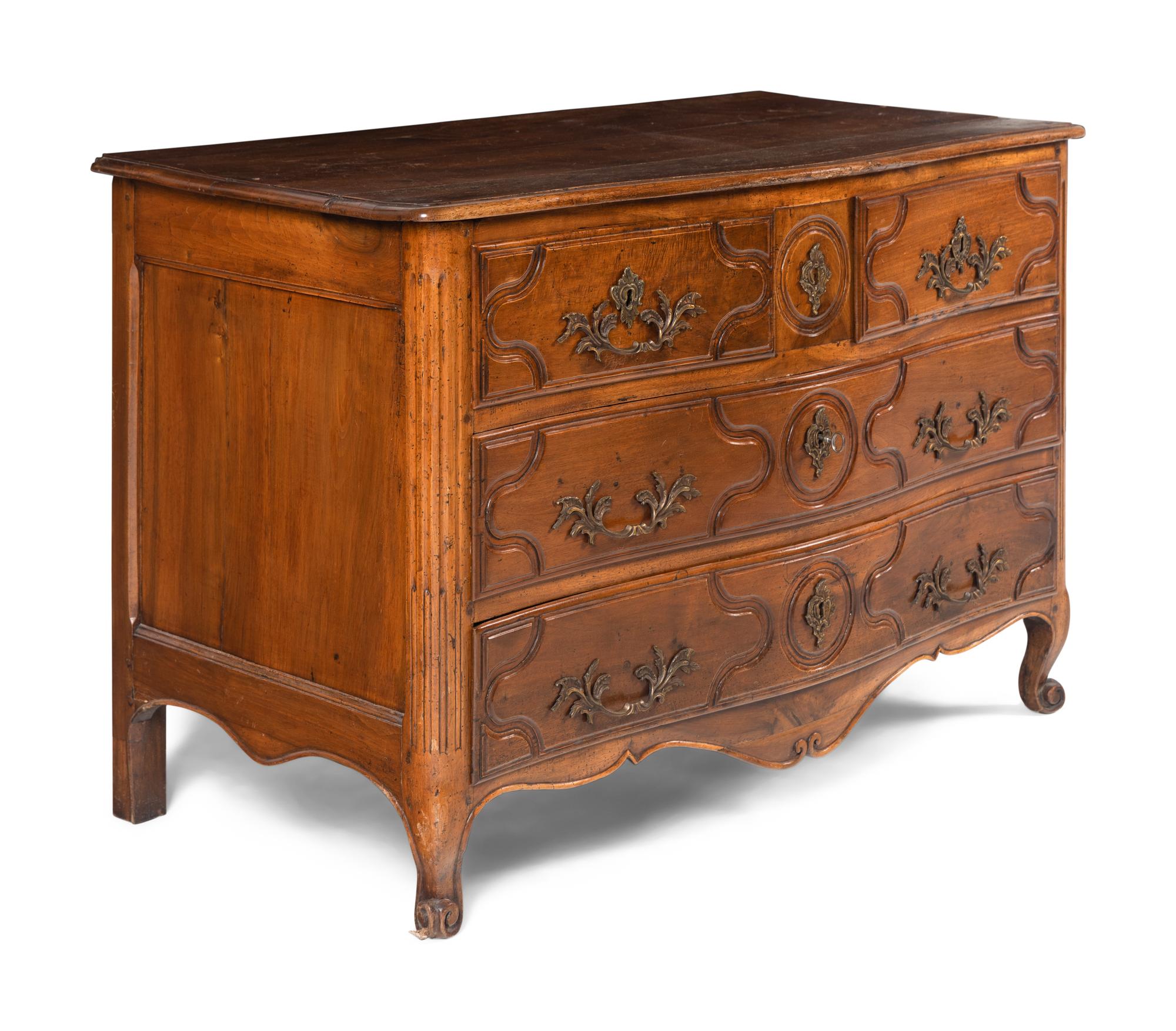 A Louis XV Provincial Walnut Commode