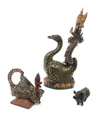 Three Balinese Carved and Painted Wood Fetish Figures Height of tallest 22 1/2 inches. — 19TH/20TH CENTURY