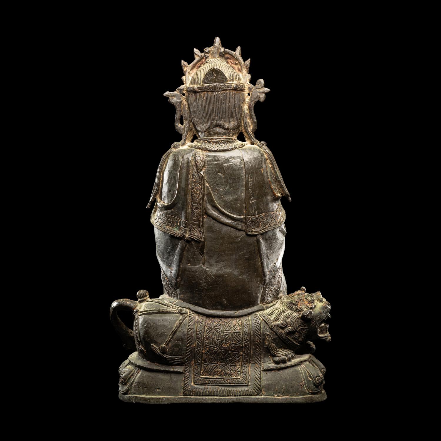 A Chinese Parcel-Gilt Bronze Figure of Guanyin, Ming Dynasty 明 銅局部鎏金觀音坐像